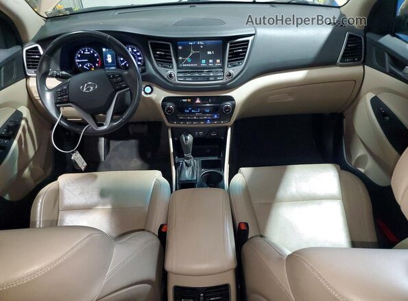 KM8J3CA21GU137542 2016 HYUNDAI TUCSON Коричневый Вид щитка приборов