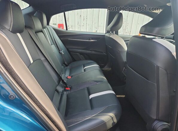 4T1DAACK3SU035138 2025 TOYOTA CAMRY Teal Rear interior view
