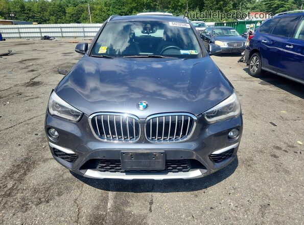 WBXHT3C31GP882429 2016 BMW X1 Gray Rear view