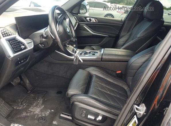 5UX13EU04R9S58824 2024 BMW X5 Black Dashboard view