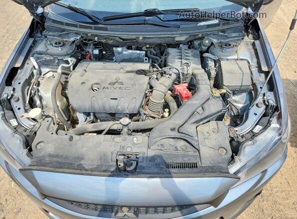 JA32U2FU0HU014261 2017 MITSUBISHI LANCER Gray Widok komory silnika
