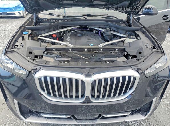 5UX13EU04R9S58824 2024 BMW X5 Black VIN sticker view
