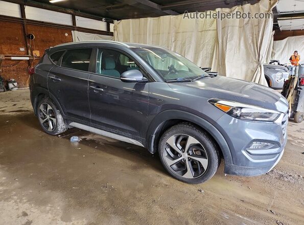 KM8J3CA2XHU459971 2017 HYUNDAI TUCSON Blue წინა ხედი