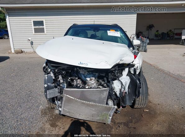 3C4NJCCB9MT508574 2021 JEEP COMPASS Белый Вид задней части салона