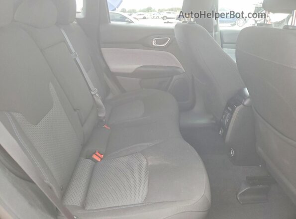 3C4NJDAN9PT558494 2023 JEEP COMPASS Black Սալոնի հետևի տեսք