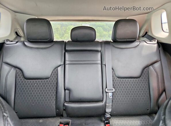 3C4NJDBB9JT304070 2018 JEEP COMPASS Black Vista de los asientos traseros