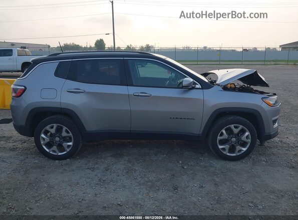 3C4NJDCBXKT812127 2019 JEEP COMPASS Серебряный Вид задней части салона