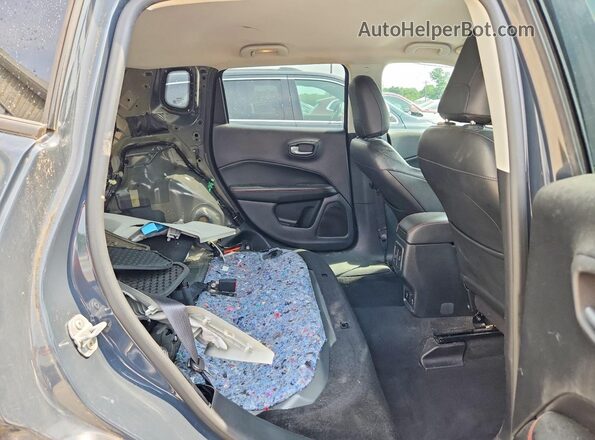3C4NJDDB5JT174706 2018 JEEP COMPASS Blue Vista de los asientos traseros