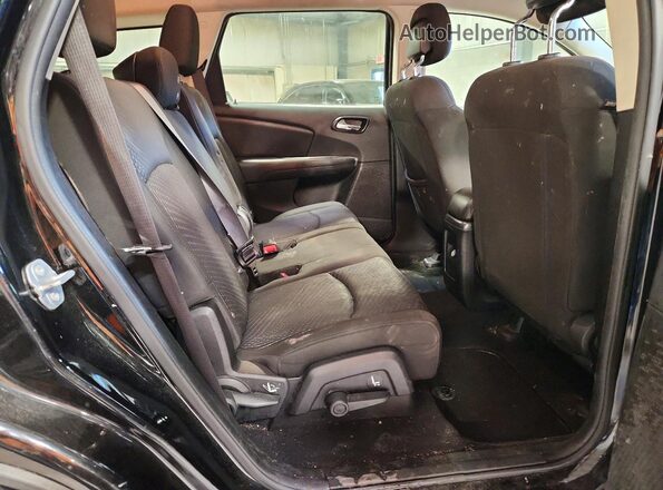 3C4PDCAB8HT563851 2017 DODGE JOURNEY Black Вид задньої частини салону
