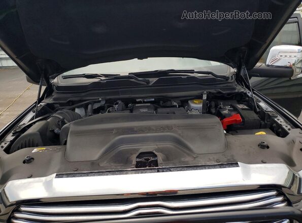 3C63R3EL8RG382396 2024 RAM 3500 Black Vista interior trasera