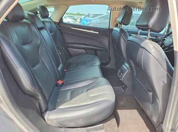 3FA6P0D98LR137048 2020 FORD FUSION Silver Rear seats view