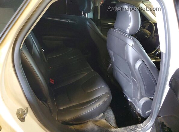 3FA6P0D99GR371608 2016 FORD FUSION White Rear seats view