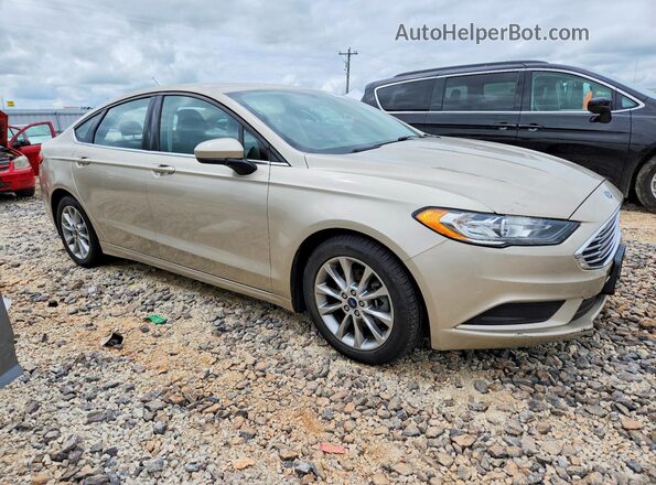 3FA6P0H73HR374952 2017 FORD FUSION Золотой Передняя правая четверть
