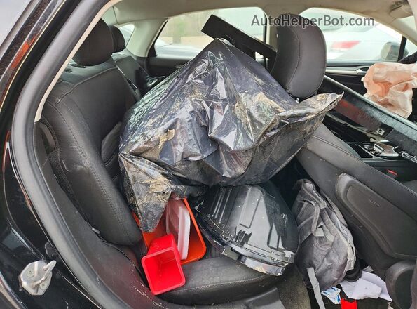 3FA6P0H76GR242489 2016 FORD FUSION Black Vista de los asientos traseros