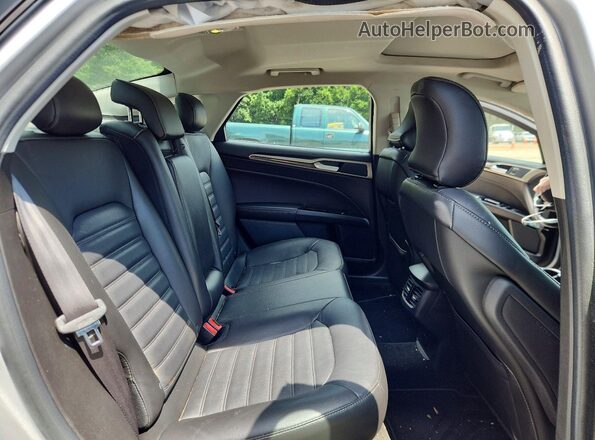 3FA6P0H91GR243423 2016 FORD FUSION Silver უკანა სავარძლების ხედი
