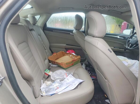 3FA6P0H95JR160164 2018 FORD FUSION Gold Rear seats view