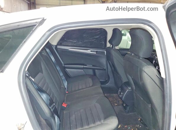 3FA6P0HDXKR214435 2019 FORD FUSION White Vista de los asientos traseros