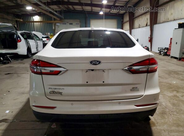 3FA6P0HDXKR214435 2019 FORD FUSION White Vista trasera