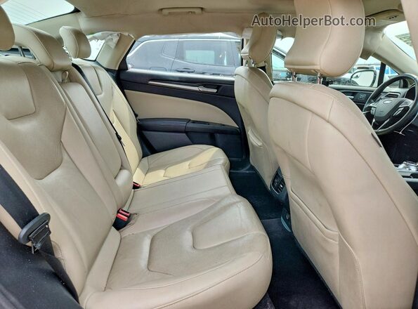 3FA6P0K99HR182798 2017 FORD FUSION White Vista de los asientos traseros