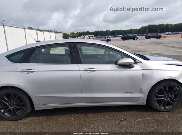 3FA6P0LU4JR170311 2018 FORD FUSION HYBRID Silver Vista interior trasera