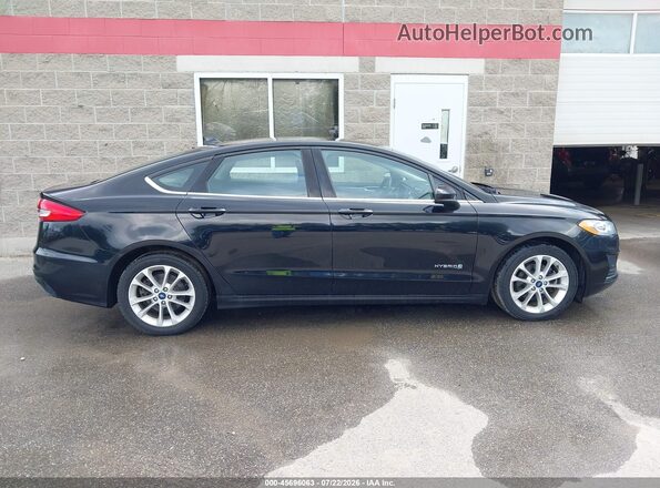3FA6P0LU6KR226945 2019 FORD FUSION HYBRID Black Widok wnętrza z tyłu