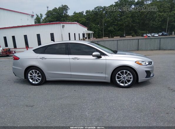 3FA6P0LU8KR274480 2019 FORD FUSION HYBRID Silver Вид задньої частини салону
