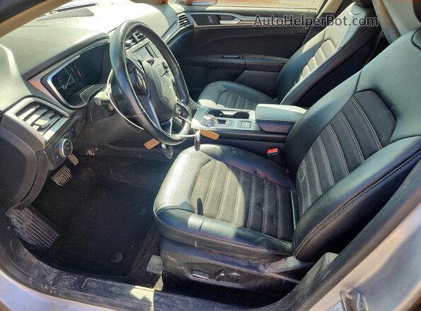 3FA6P0LU9HR387041 2017 FORD FUSION Серебряный Вид салона спереди
