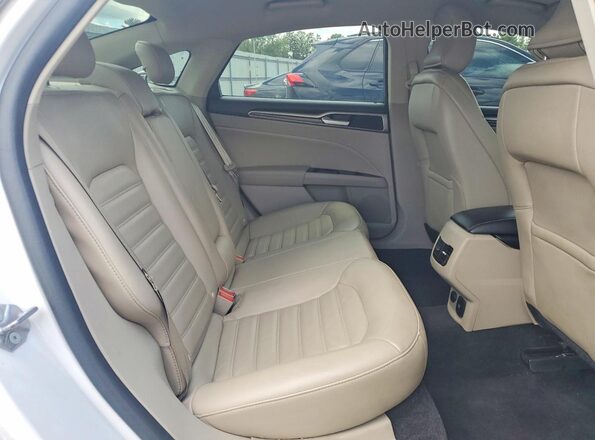 3FA6P0LUXHR400573 2017 FORD FUSION White Vista de los asientos traseros