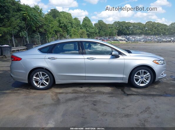 3FA6P0LUXJR165436 2018 FORD FUSION HYBRID Серебряный Вид задней части салона