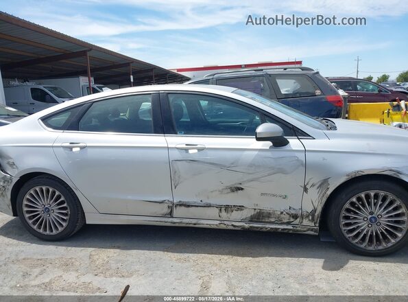 3FA6P0LUXKR120725 2019 FORD FUSION HYBRID Gray Vista interior trasera