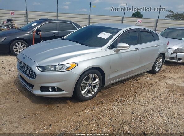 3FA6P0RUXGR296785 2016 FORD FUSION HYBRID Серебряный Передняя левая четверть