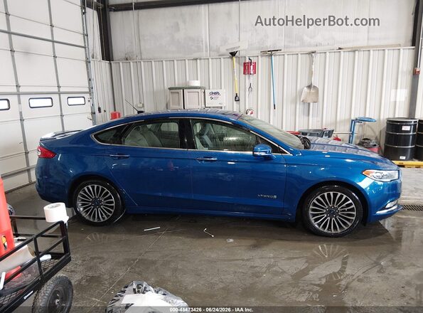 3FA6P0RUXHR383992 2017 FORD FUSION HYBRID Blue Vista interior trasera