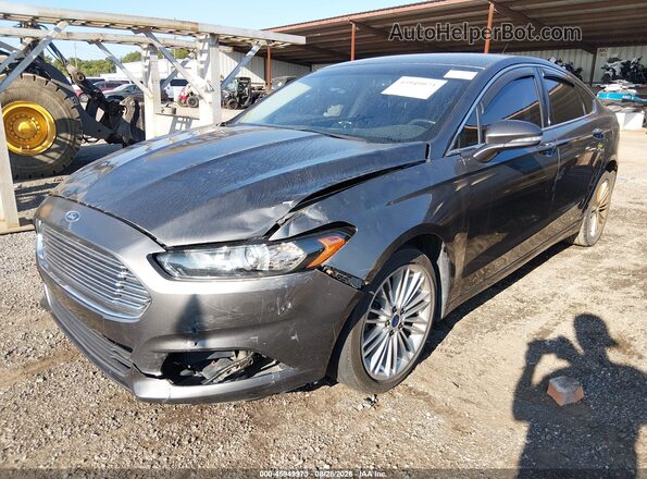 3FA6P0T99GR286513 2016 FORD FUSION Gray Vista tres cuartos delantera izquierda