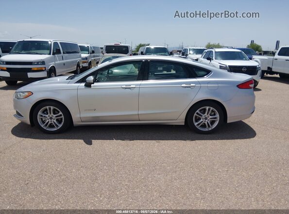 3FA6P0UU0JR243611 2018 FORD FUSION HYBRID Серебряный Вид задней части салона