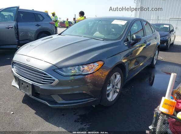 3FA6P0UU1JR235713 2018 FORD FUSION HYBRID Gray Vista tres cuartos delantera izquierda
