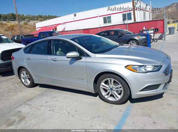 3FA6P0UU2JR100689 2018 FORD FUSION HYBRID Серебряный 