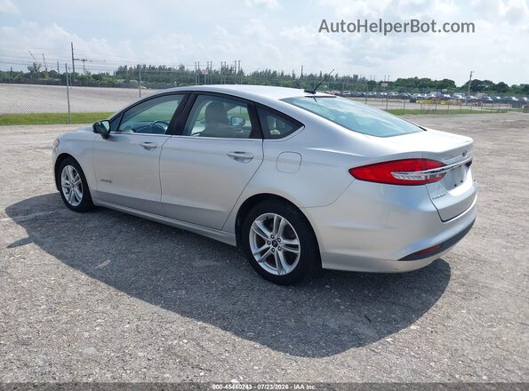 3FA6P0UU3JR271502 2018 FORD FUSION HYBRID Silver Trasero izquierdo
