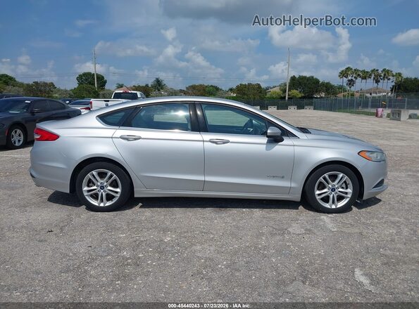 3FA6P0UU3JR271502 2018 FORD FUSION HYBRID Silver Vista interior trasera