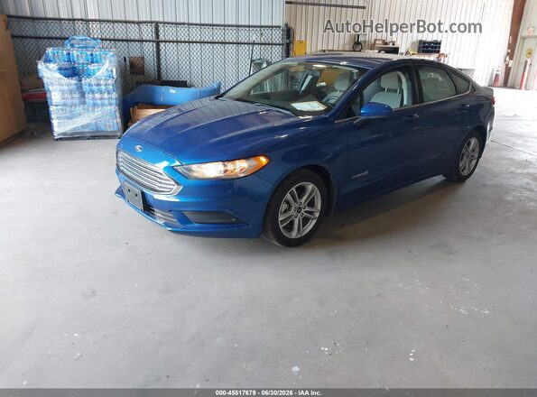 3FA6P0UU4JR254630 2018 FORD FUSION HYBRID Gray Vista tres cuartos delantera izquierda