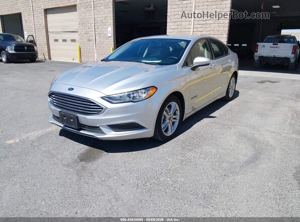 3FA6P0UU6JR243466 2018 FORD FUSION HYBRID Серебряный Передняя левая четверть