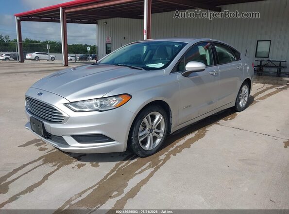 3FA6P0UU9JR235720 2018 FORD FUSION HYBRID Silver Vista tres cuartos delantera izquierda