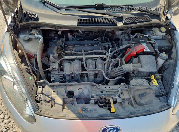 3FADP4BJXHM158063 2017 FORD FIESTA Silver Vista interior trasera