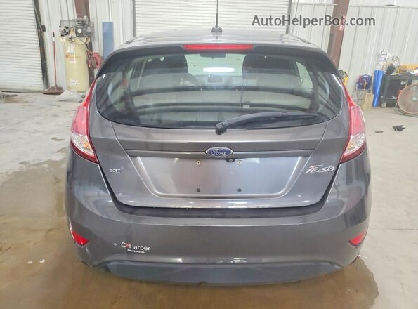 3FADP4EJ3JM104069 2018 FORD FIESTA Gray Vista trasera