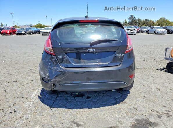 3FADP4EJ3JM117436 2018 FORD FIESTA Black Rear view