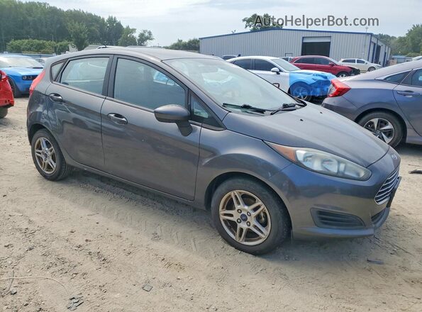 3FADP4EJ3JM122779 2018 FORD FIESTA Серебряный Передняя правая четверть