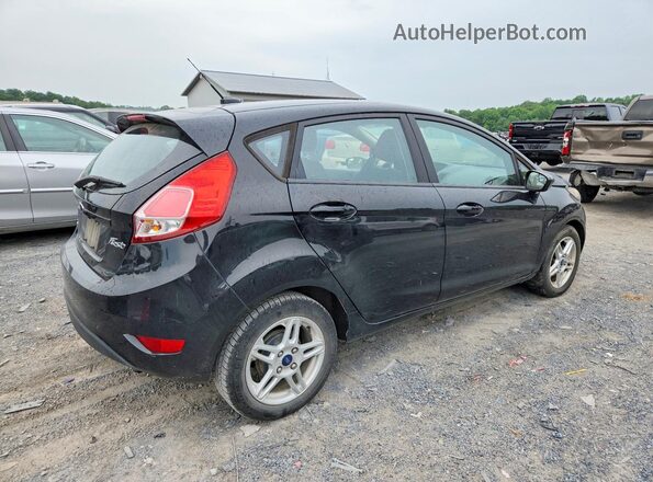3FADP4EJ6JM101182 2018 FORD FIESTA Черный Задняя правая четверть