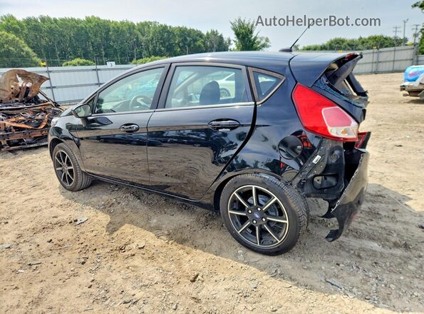 3FADP4EJ7KM129039 2019 FORD FIESTA Black Trasero izquierdo
