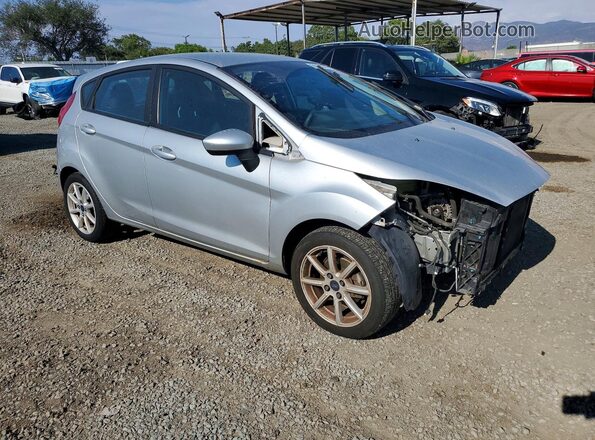 3FADP4EJ8KM144049 2019 FORD FIESTA Серебряный Передняя правая четверть
