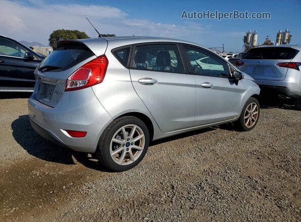 3FADP4EJ8KM144049 2019 FORD FIESTA Серебряный Задняя правая четверть