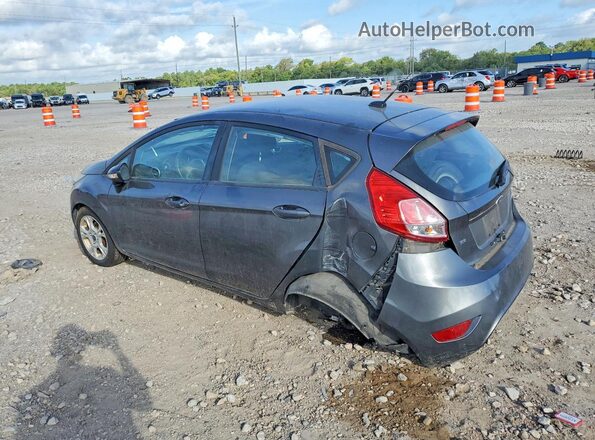3FADP4EJXGM134033 2016 FORD FIESTA Gray Trasero izquierdo